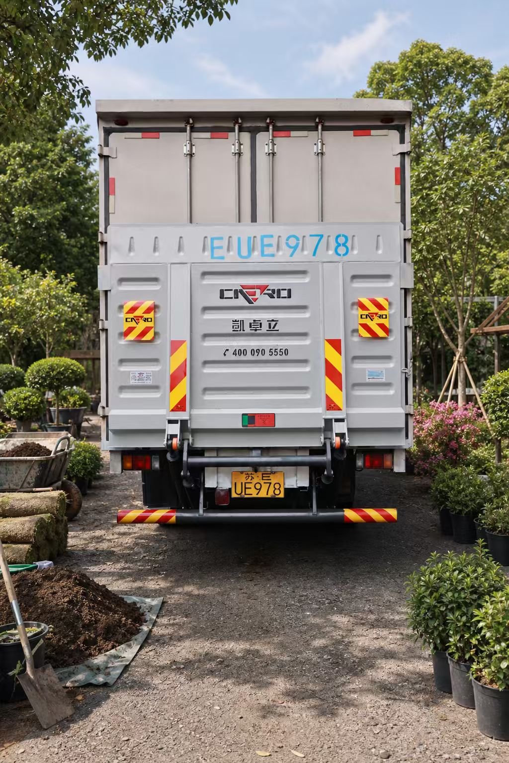 Lightweight tail lift truck for skilled-trade and landscaping fleets with compact rear platform and maintenance-friendly design